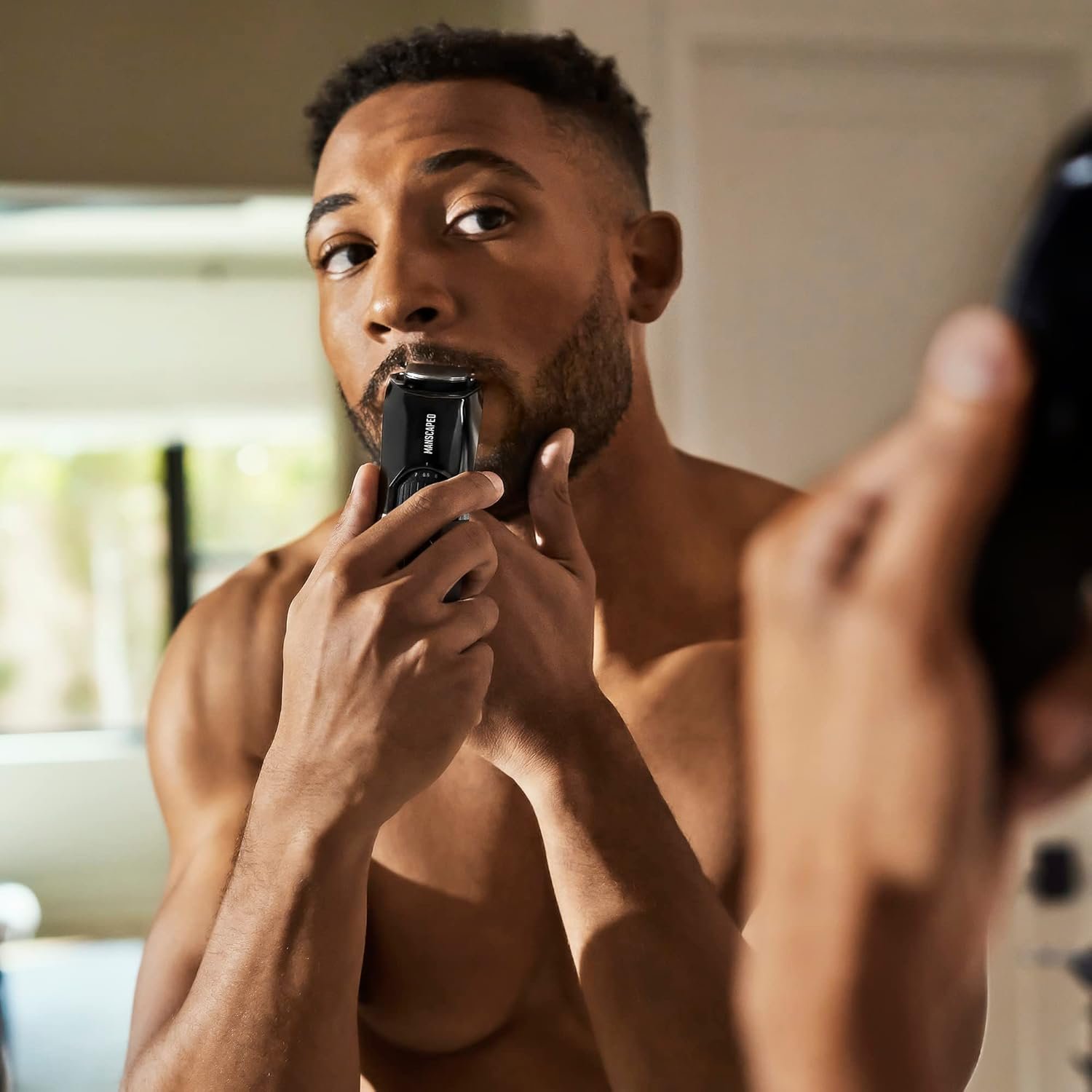 MANSCAPED® The Beard Hedger® Premium Men's Beard Trimmer, 20 Length Adjustable Blade Wheel, Stainless Steel T-Blade for Precision Facial Hair Trimming, Cordless Waterproof Wet/Dry Clipper - Image 8