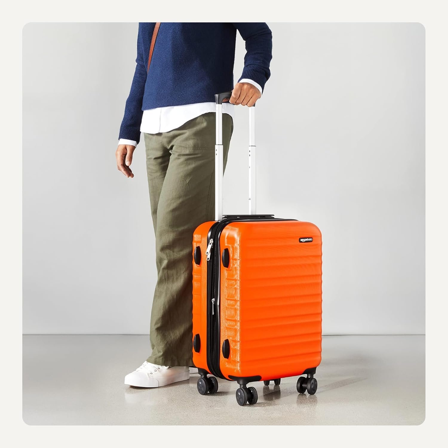 Amazon Basics 21" Hardside Carry-On Luggage, Hardshell Suitcase With Wheels, Expandable For Up to 25% More Space, With Scratch-Resistant Surface, Four Multi-directional Wheels, Orange - Image 3