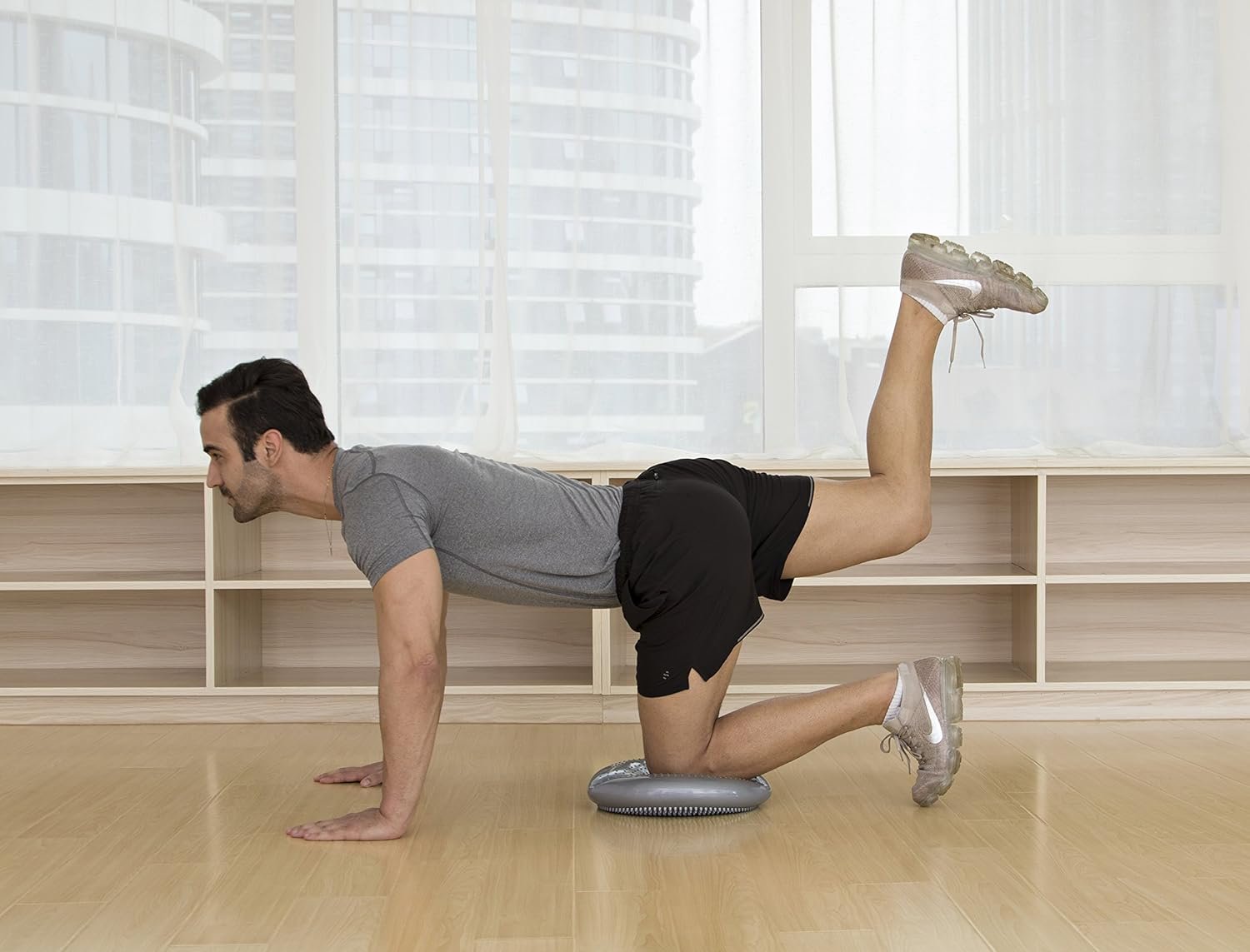 JFIT Inflatable Balance and Stability Disc - Large Yoga Wobble Cushion Trainer with Pump - Core Fitness and Workout Equipment Discs for Home - Office Chair, Ankle Strength Training and Dog or Pet Activity, Blue, 13-Inch - Image 9