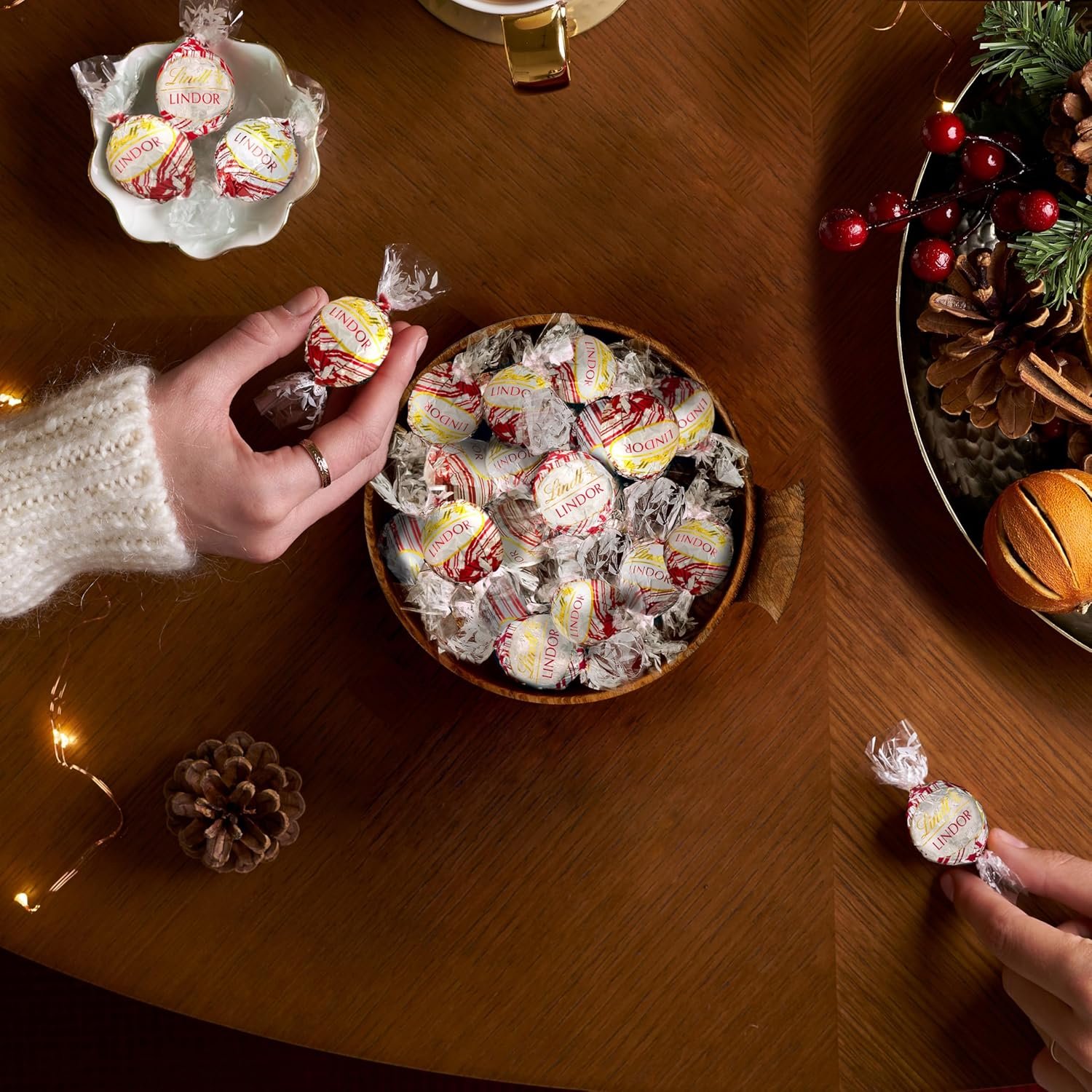 Lindt LINDOR White Chocolate Peppermint Candy Truffles with Smooth Peppermint Truffle Center, 19 oz. Bag - Image 2